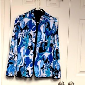 Sporty jacket. Colorful tones of blue on white.